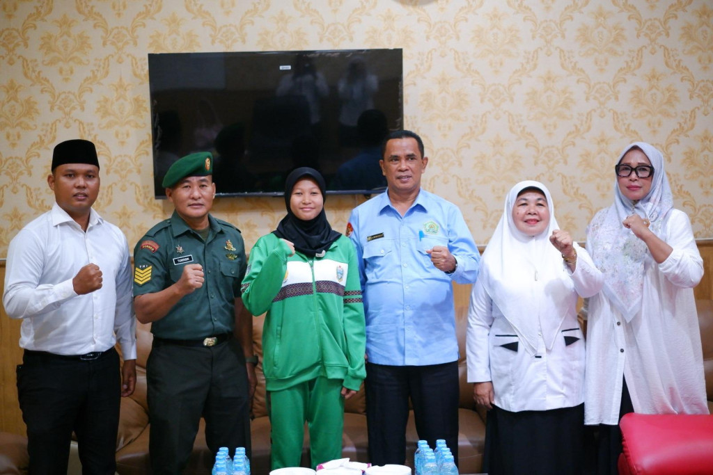 Siswi MTsN 2 Medan Siap Berlaga di Ajang Taekwondo Internasional