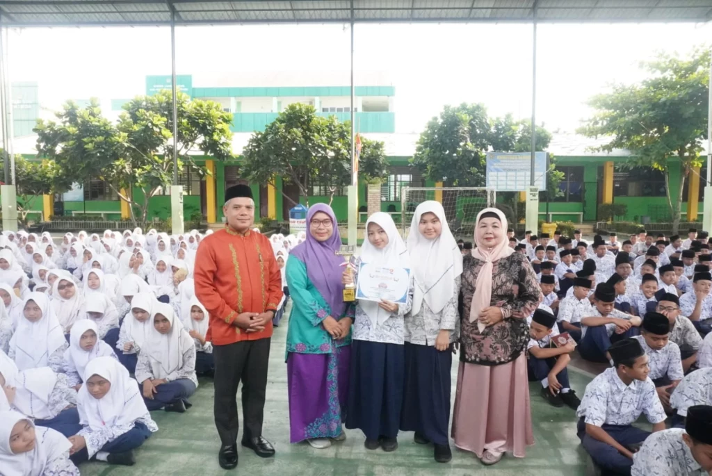 Siswi MTsN 2 Medan Raih Juara Satu MHQ 5 Juz 