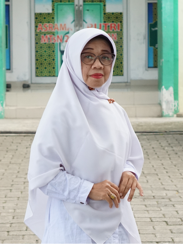 Nuraini Erlinda, S.Ag, M.Pd